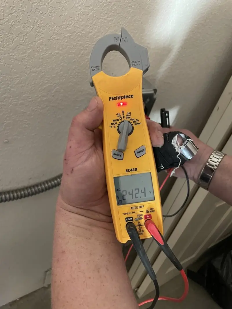 Voltage testing with clamp meter during Hot Tub / Pool Electrical Wiring in Muscle Shoals